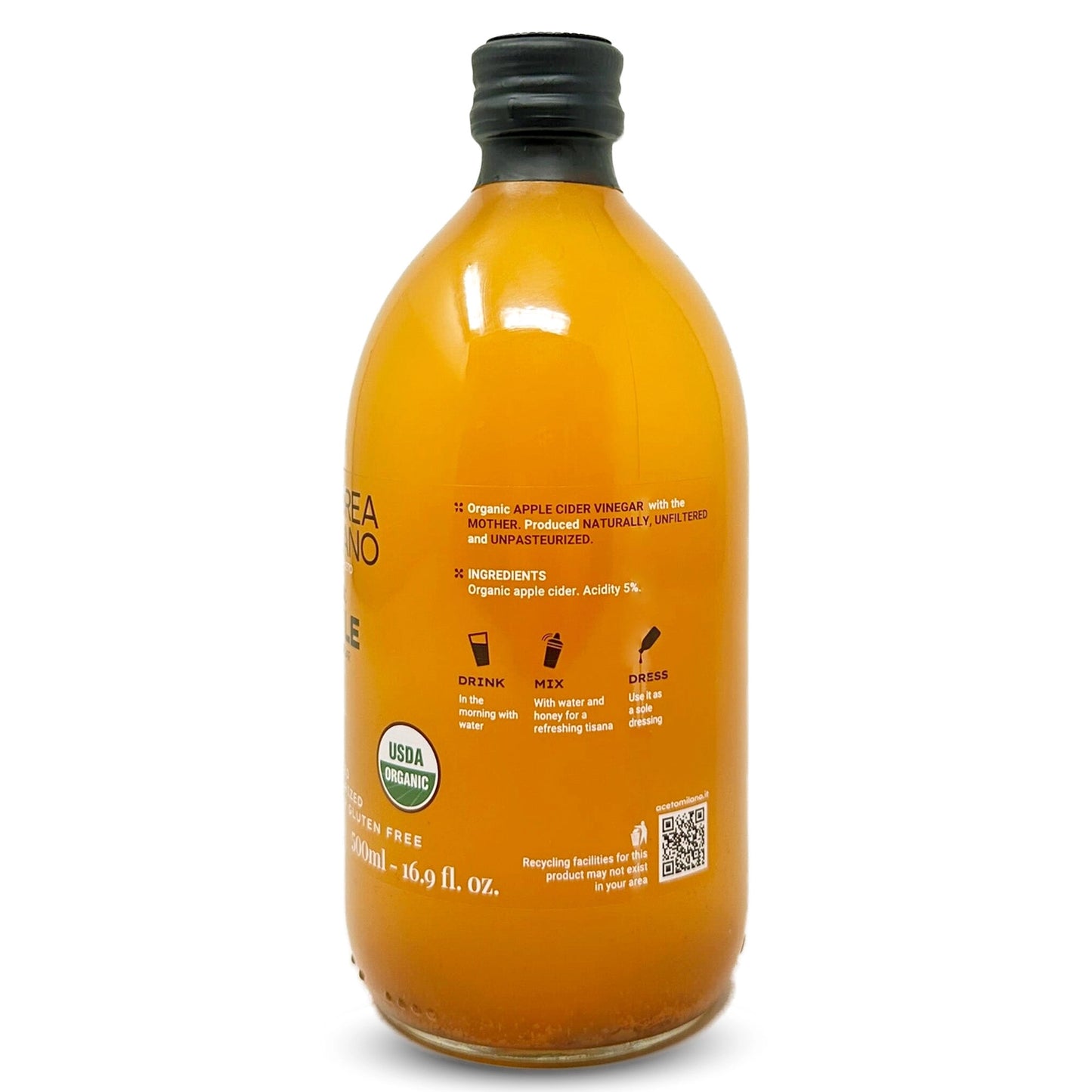 Bottle of organic apple cider vinegar with a black cap on a white background