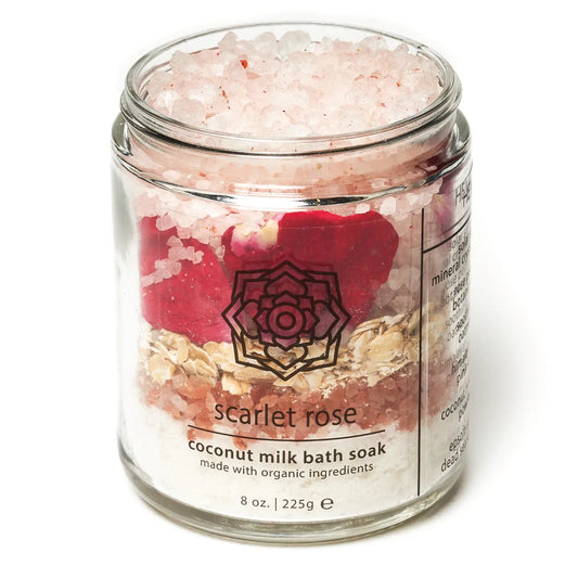 Jar of Scarlet Rose coconut milk bath soak with a visible brand logo on a white background