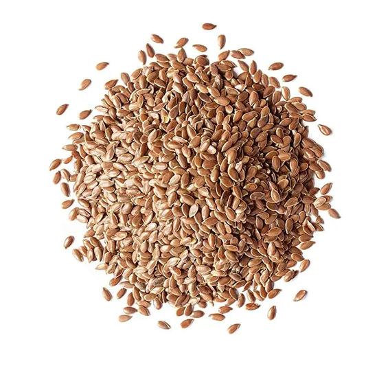 Pile of flaxseeds on a white background