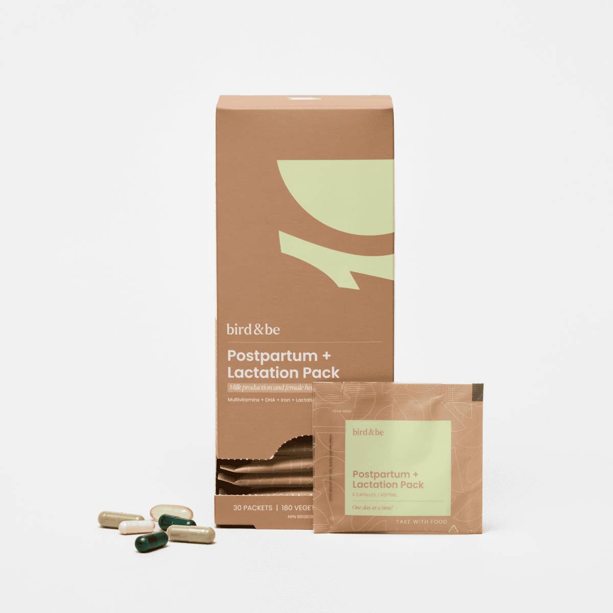 Postpartum and lactation pack by bird & be with packaging and capsules on a white background