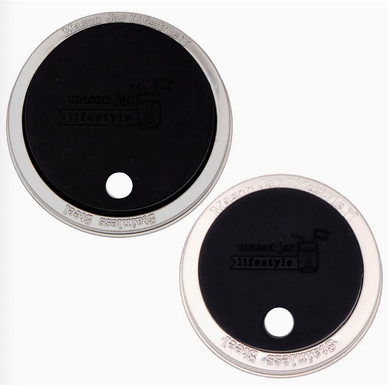 Two round black and silver coasters with 'Lifestyle' branding on a white background
