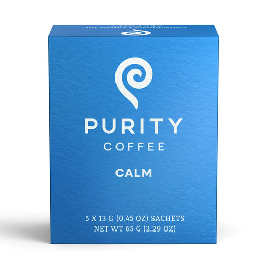 Blue box of Purity Coffee with 'Calm' flavor on a white background